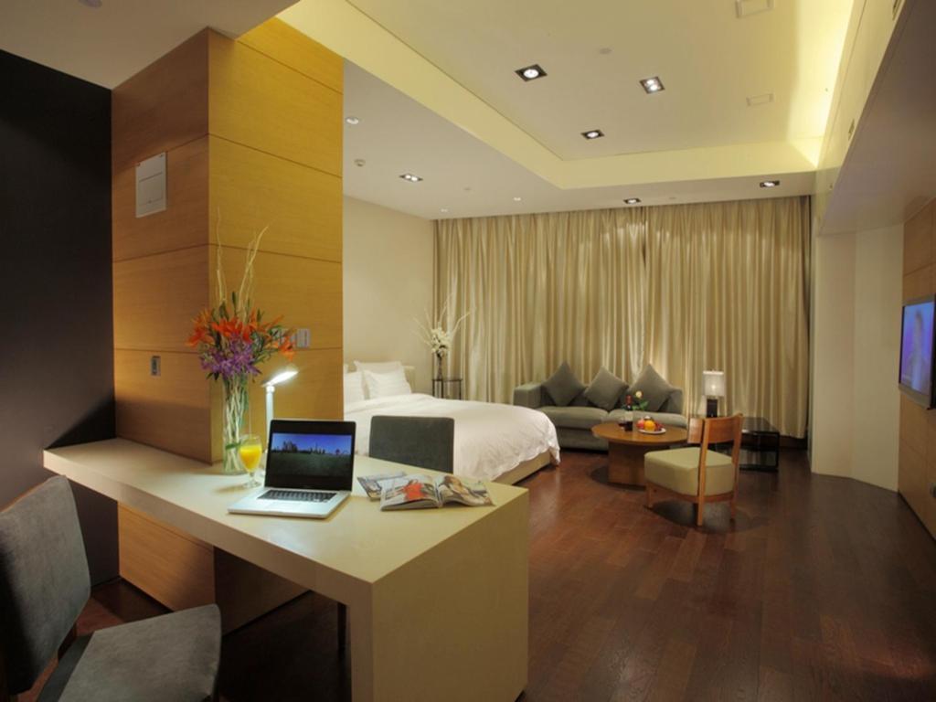 Grand Madison Qingdao Harbour-View Central（Former Qingdao Farglory Hotel） Zimmer foto